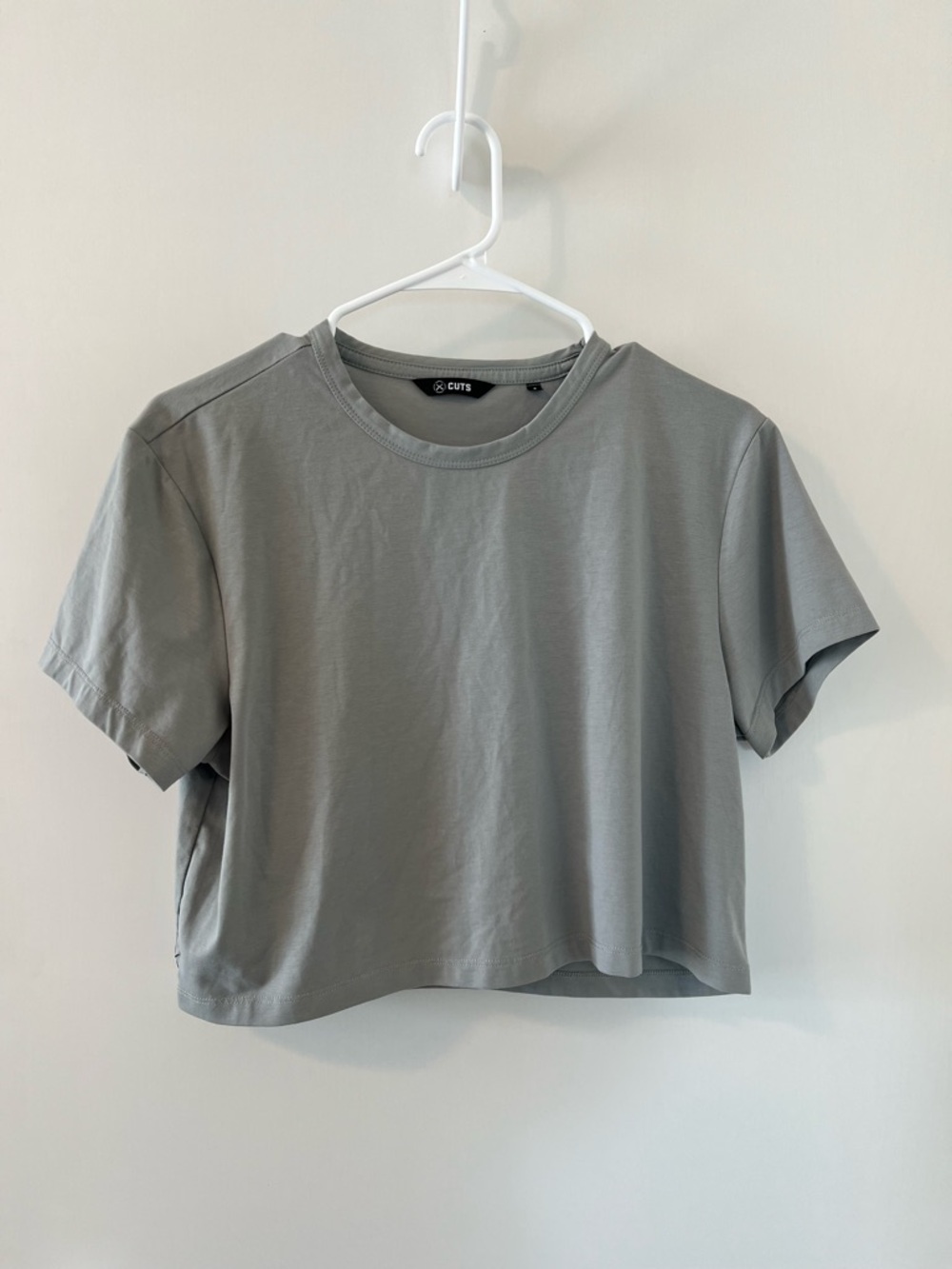 Cuts clothing almost Friday tee